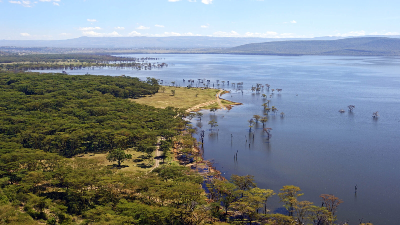Lake Nakuru safari landscape with wildlife and scenic lake views in Kenya